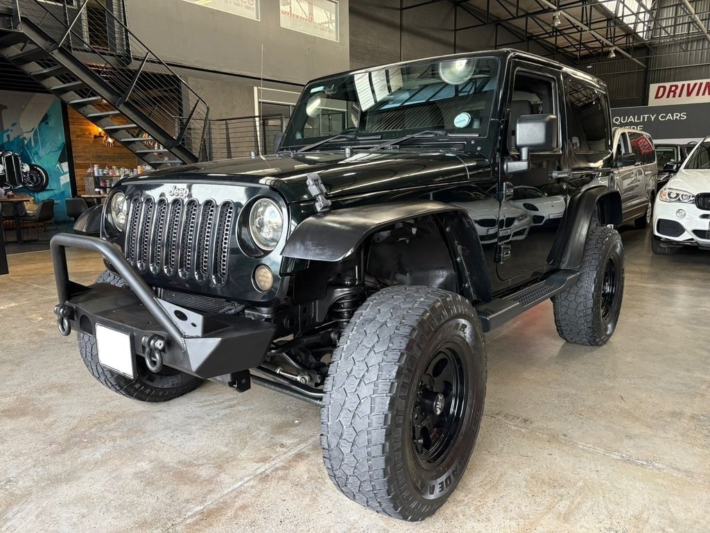 2012 Jeep Wrangler Sahara WRANGLER SAHARA 3.6L V6 A/T 2DR in Black, for sale at Driving Force Cape Town